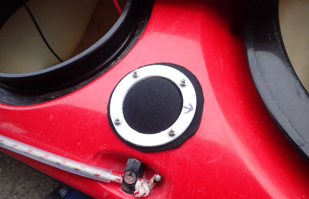 Showing the air button protected by a neoprene sand cover.